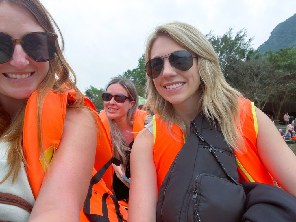 girls on the boat at Trang An - part of out Ninh Binh tour