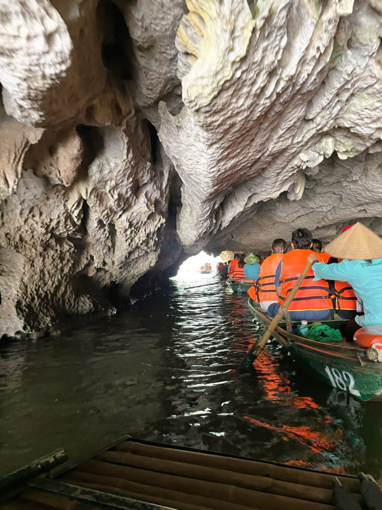 rowing through the caves at Trang An - part of out Ninh Binh tour