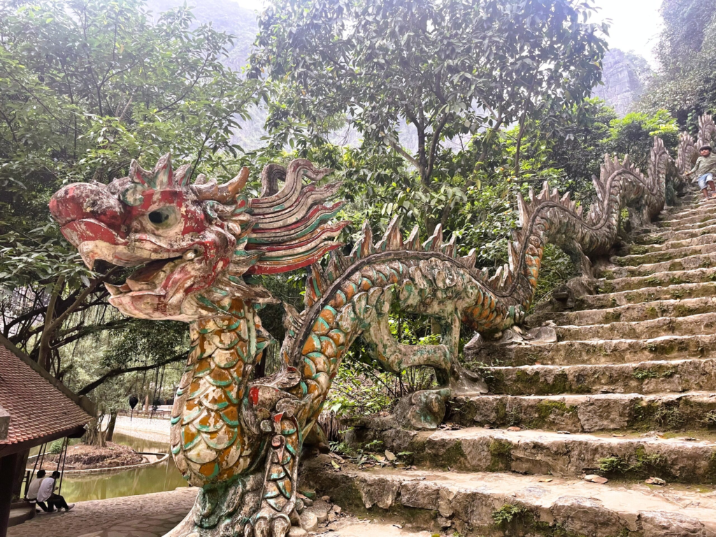 Dragon sculpture on the stairs up to Hang Mua on our Ninh Binh tour